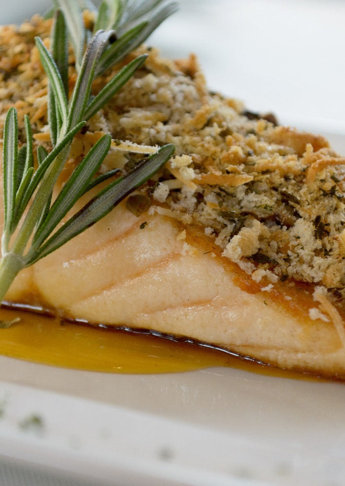 Pre-toasting panko in oil, then pressing it onto a mustard-coated fillet, yields a crisp, deeply colored crust right as the salmon turns flaky. YUZUKOSHO integrates into the crumb for aromatic heat, while a small pour of honey–soy adds sheen and balance w