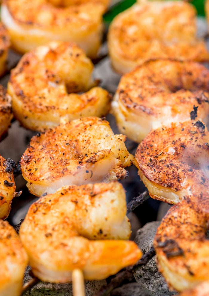 Cajun Shrimp on a skewer on a grill